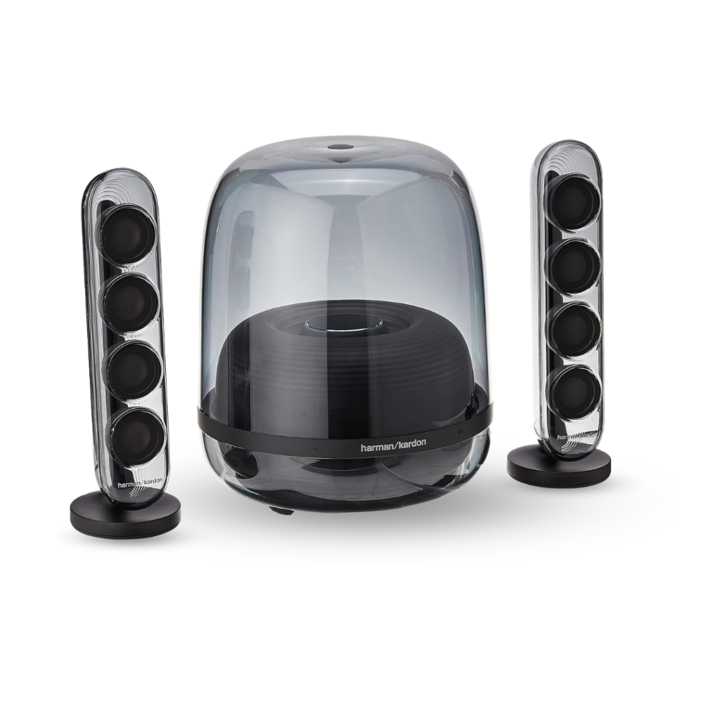 Harman Kardon SoundSticks 4 Bluetooth speaker system consists of a central, dome-shaped transparent subwoofer, which houses a dark, ridged internal speaker, and is flanked by two tall, cylindrical, clear satellite speakers. Each satellite speaker conspicuously features four stacked black speaker drivers, all contributing to the system's distinctive, modern aesthetic.