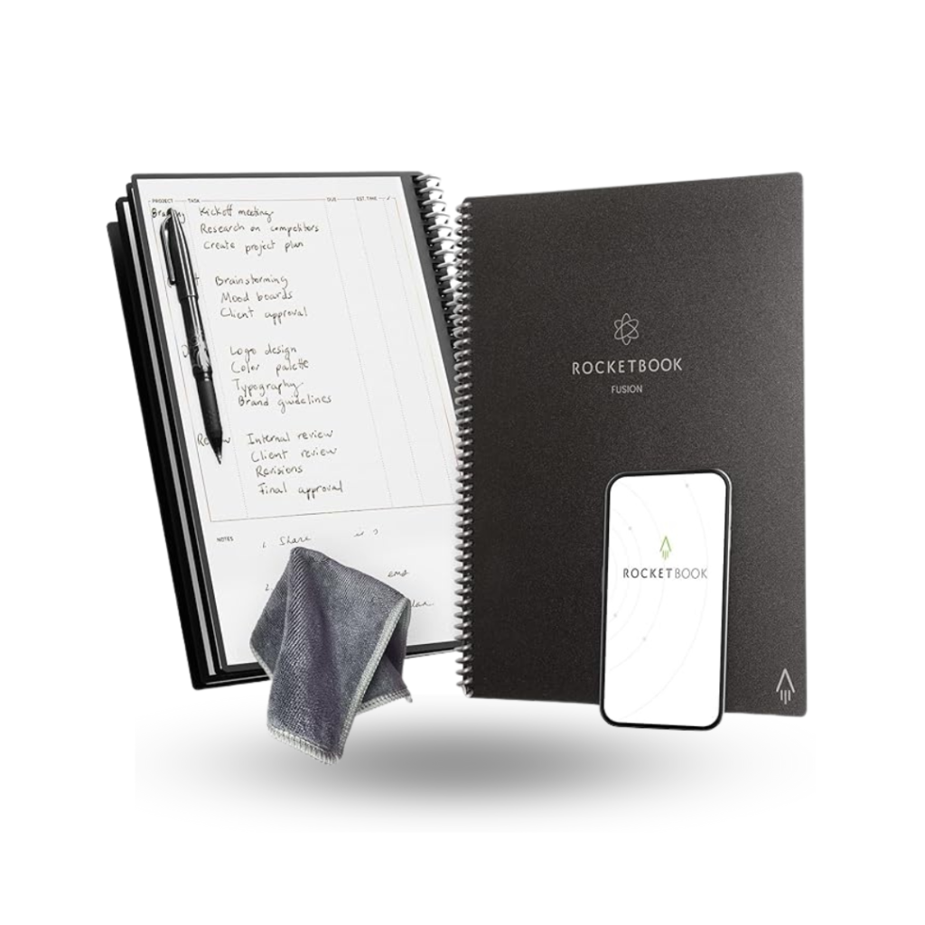 A product image of the "Rocketbook Fusion Smart Reusable Notebook". The image shows an open spiral-bound notebook on the left, with handwritten notes on a page, and a black pen resting on top. A small, folded grey microfiber cloth is placed in front of the open notebook. To the right, the notebook's dark grey front cover is shown, featuring the "Rocketbook Fusion" logo. Below the cover, a smartphone is shown on its screen, displaying the "Rocketbook" app.